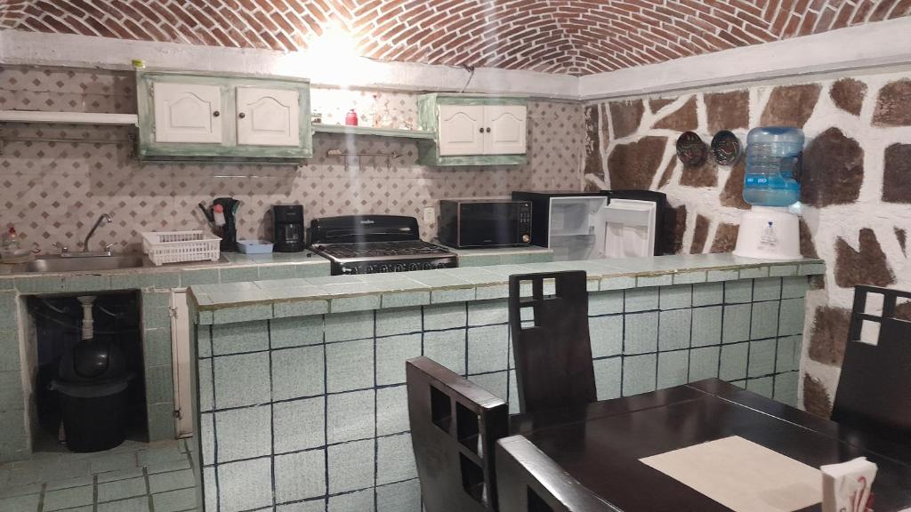 Kuchyň nebo kuchyňský kout v ubytování Posada Casa Sofía