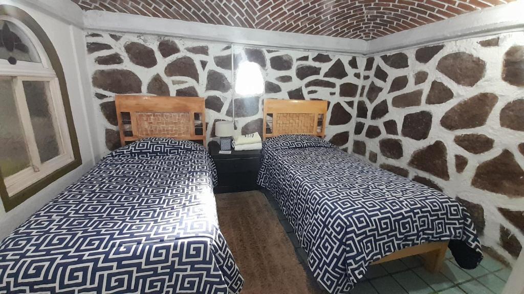 Postel nebo postele na pokoji v ubytování Posada Casa Sofía