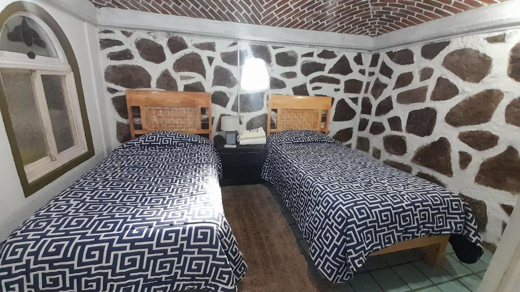 Postel nebo postele na pokoji v ubytování Posada Casa Sofía