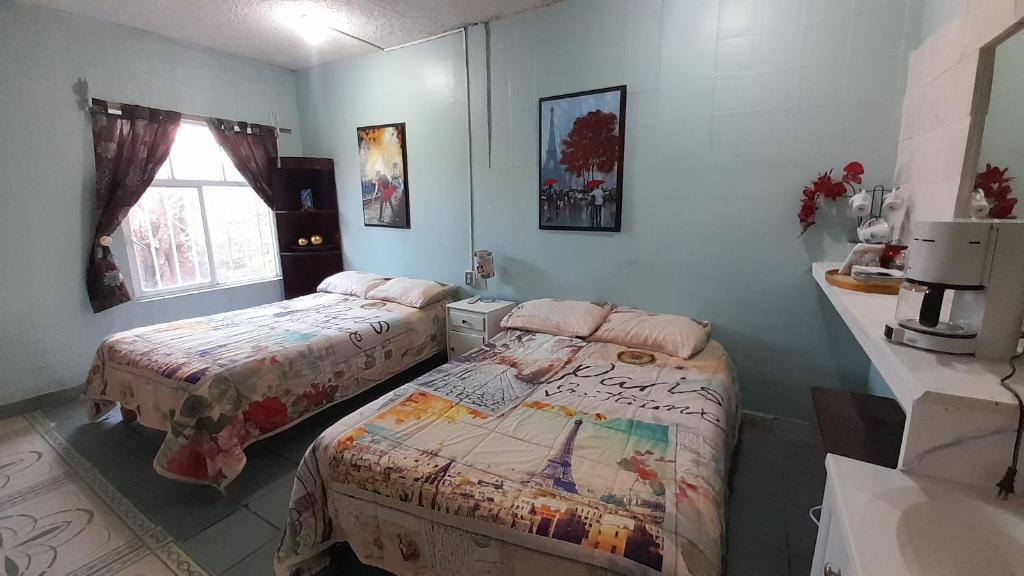 Postel nebo postele na pokoji v ubytování Posada Casa Sofía