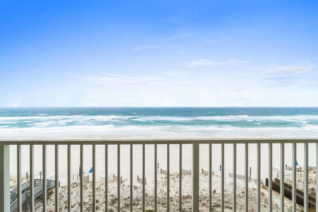 a view of the beach from the balcony of a condo at Sea Dunes 502 Beach Oasis Beachfront Condo with Pool Hot Tub Free Beach Service 0488 in Fort Walton Beach