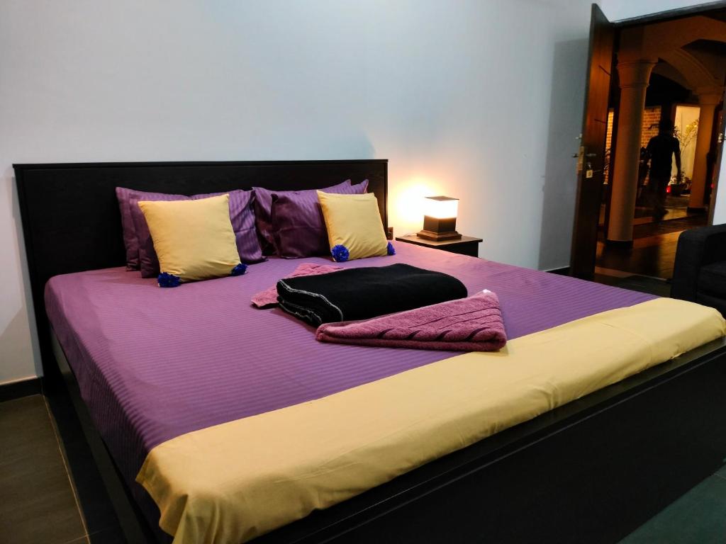 Postel nebo postele na pokoji v ubytování Taj Residence