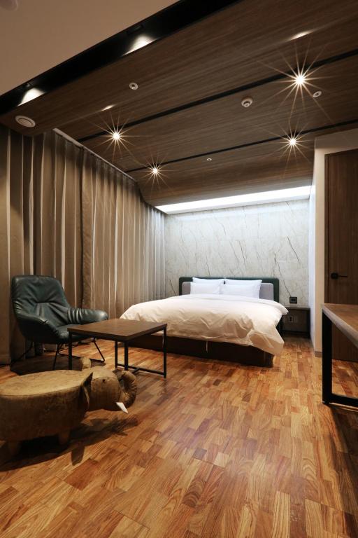 Postel nebo postele na pokoji v ubytování Hotel CL