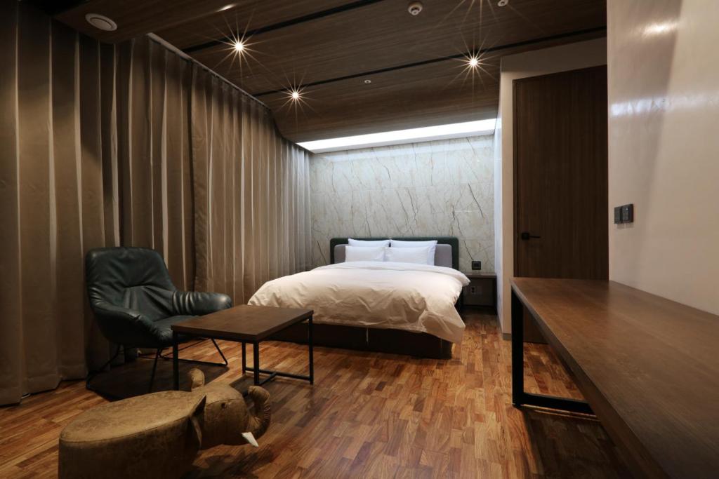 Postel nebo postele na pokoji v ubytování Hotel CL