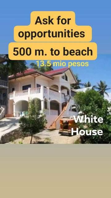 a sign that says ask for opportunities m to beach at RELAX White house, Puerto Galera in Puerto Galera