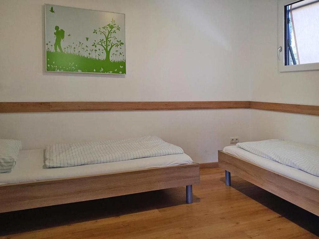 A bed or beds in a room at 4 star holiday home in Gaal im Murtal