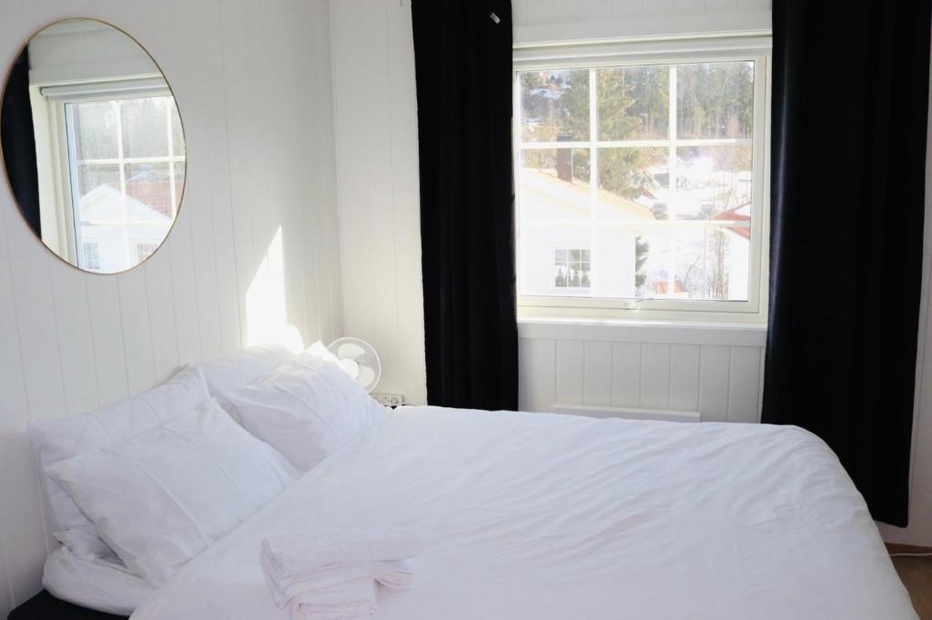 Postel nebo postele na pokoji v ubytování Les Homes - Modern & Cozy Stay Near Oslo Airport