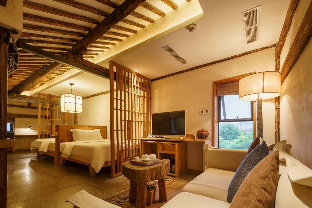 TV a/nebo společenská místnost v ubytování Huangshan Shanshui Boutique Hotel Liyang Scenic Area