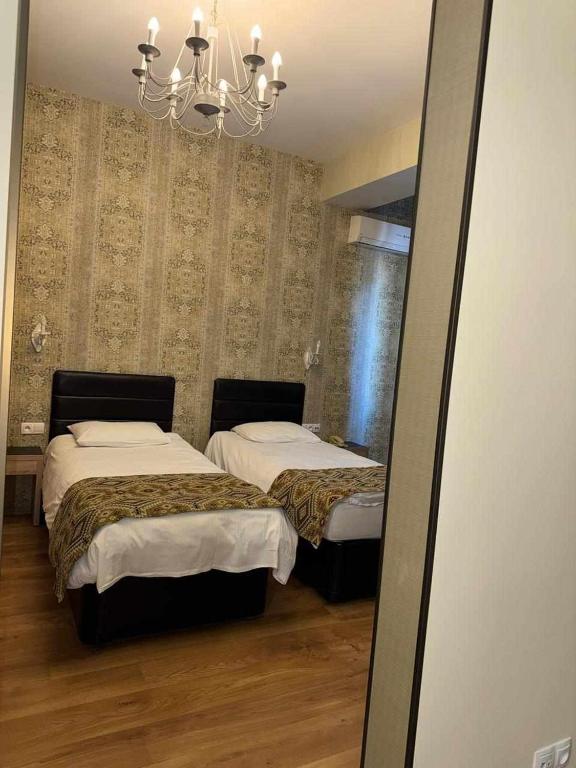 Postel nebo postele na pokoji v ubytování Hotel Diamond