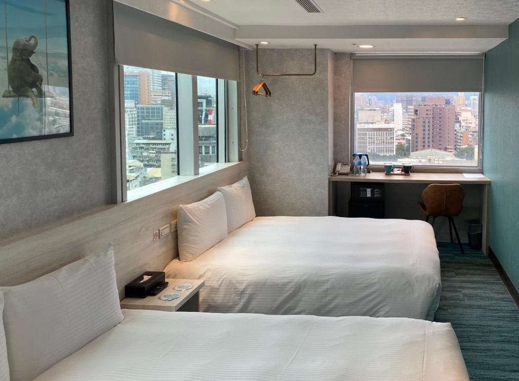Katil atau katil-katil dalam bilik di 西門雲町旅店 Sky Gate Hotel