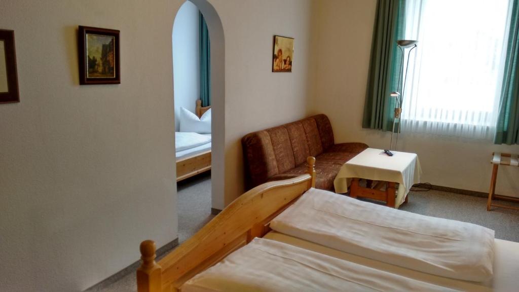 Postel nebo postele na pokoji v ubytování Hotel Unterwirt