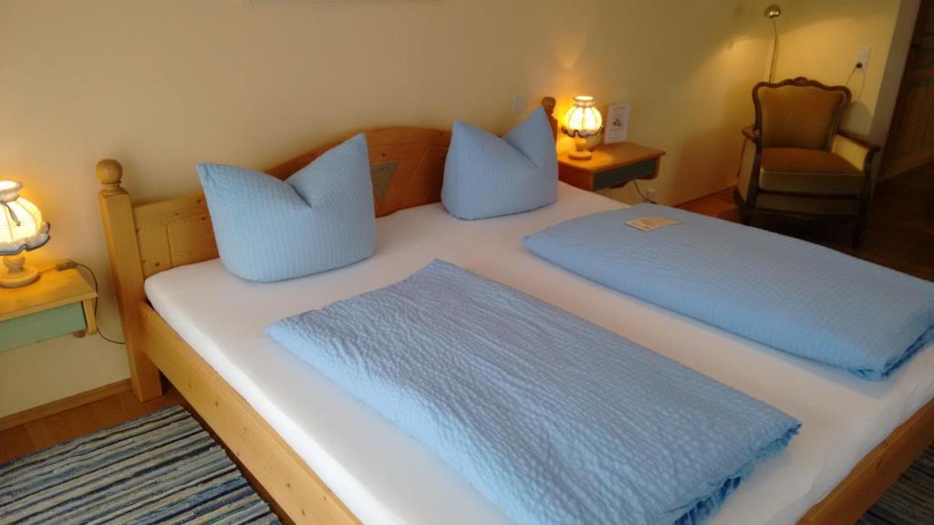 Postel nebo postele na pokoji v ubytování Hotel Unterwirt