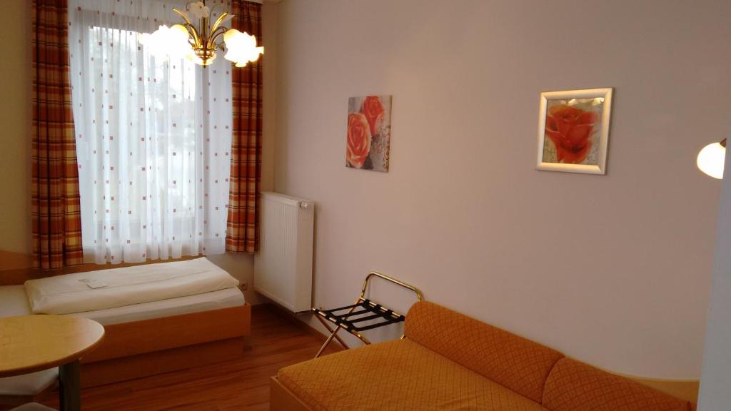 Postel nebo postele na pokoji v ubytování Hotel Unterwirt