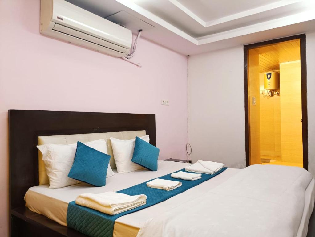 Postel nebo postele na pokoji v ubytování Hotel Blueberry