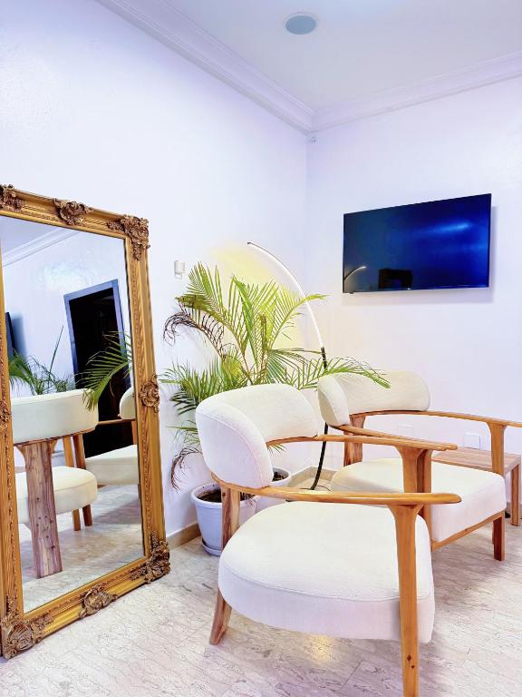 TV a/nebo společenská místnost v ubytování HIS Dulce Apartments