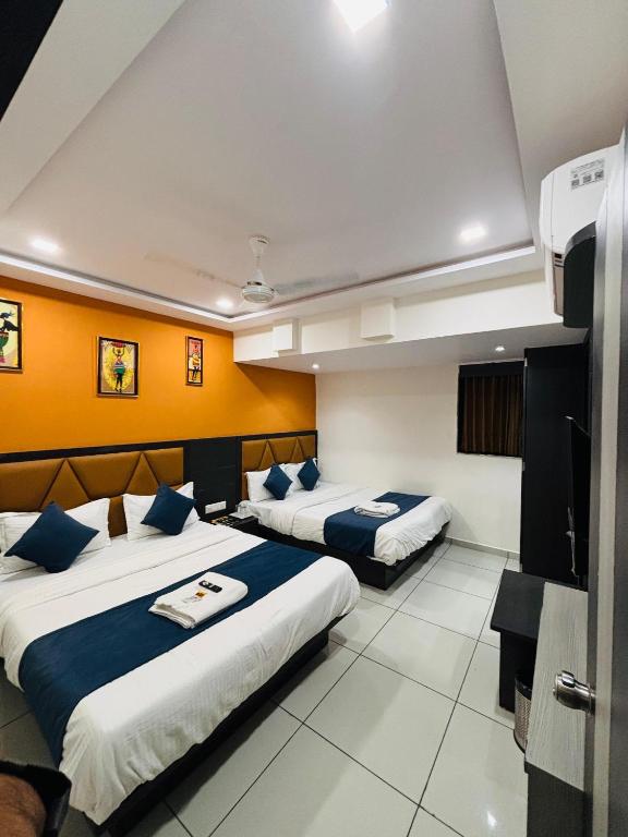 Postel nebo postele na pokoji v ubytování Hotel Sunview