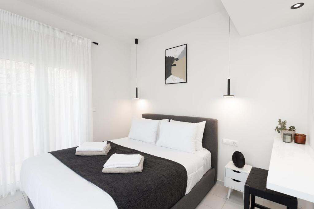 Postel nebo postele na pokoji v ubytování Panor Villas