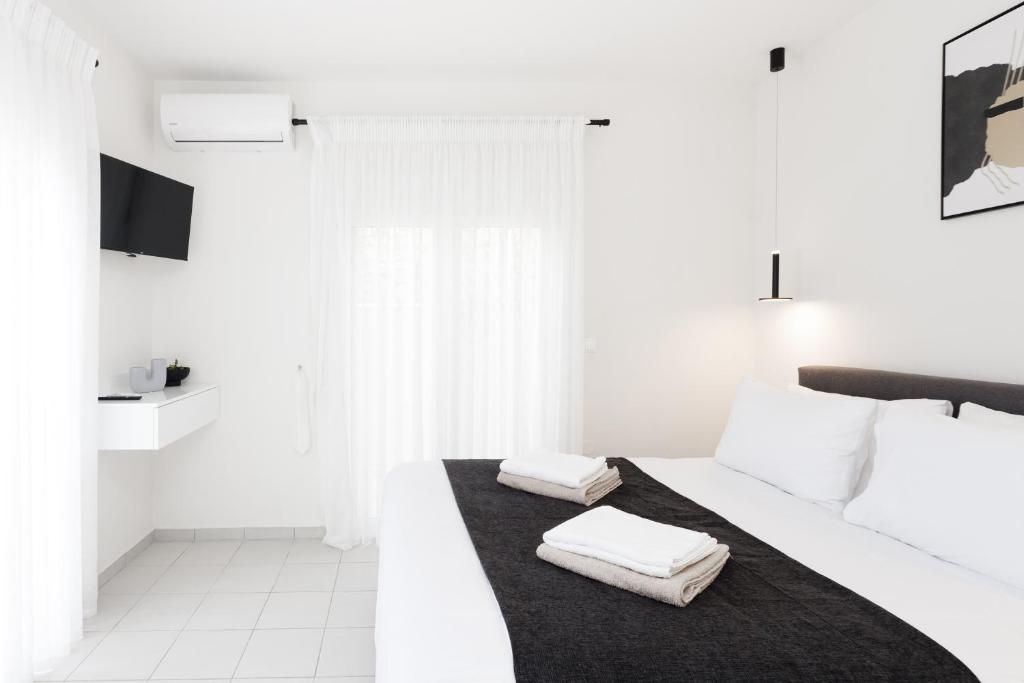 Postel nebo postele na pokoji v ubytování Panor Villas