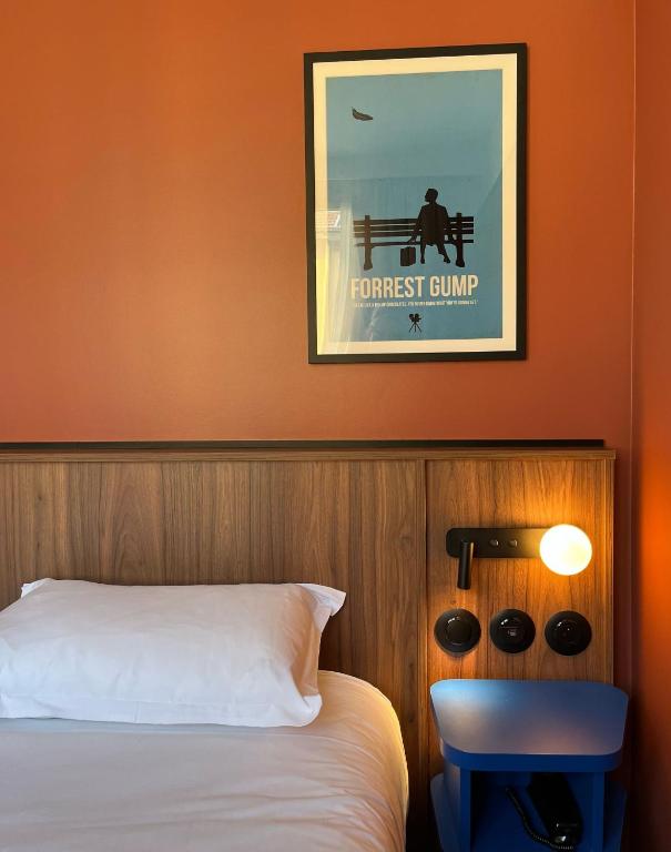 Postel nebo postele na pokoji v ubytování Hotel Le Lumière