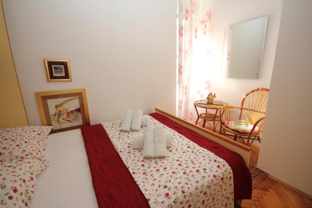 Posteľ alebo postele v izbe v ubytovaní Apartment Adriatica City