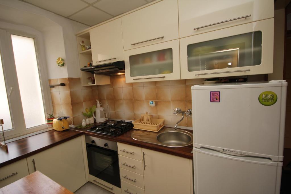 Kuchyňa alebo kuchynka v ubytovaní Apartment Adriatica City