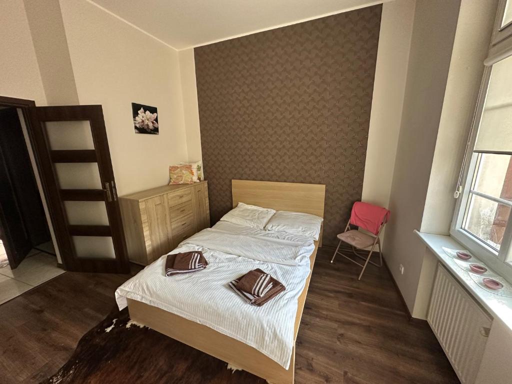 Posteľ alebo postele v izbe v ubytovaní Gdańskie Apartamenty - Apartamenty na Świetego Ducha z 2 sypialniami