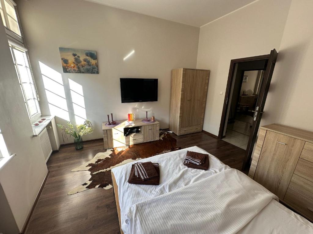 Posteľ alebo postele v izbe v ubytovaní Gdańskie Apartamenty - Apartamenty na Świetego Ducha z 2 sypialniami
