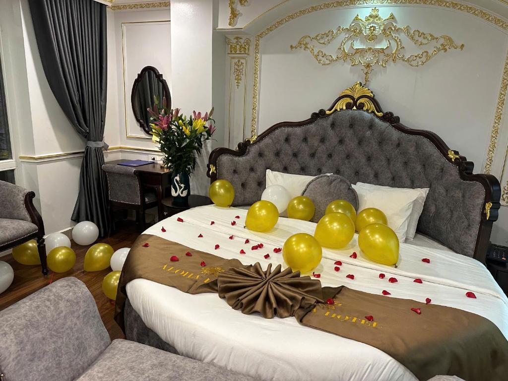 Postel nebo postele na pokoji v ubytování Aloha Hotel