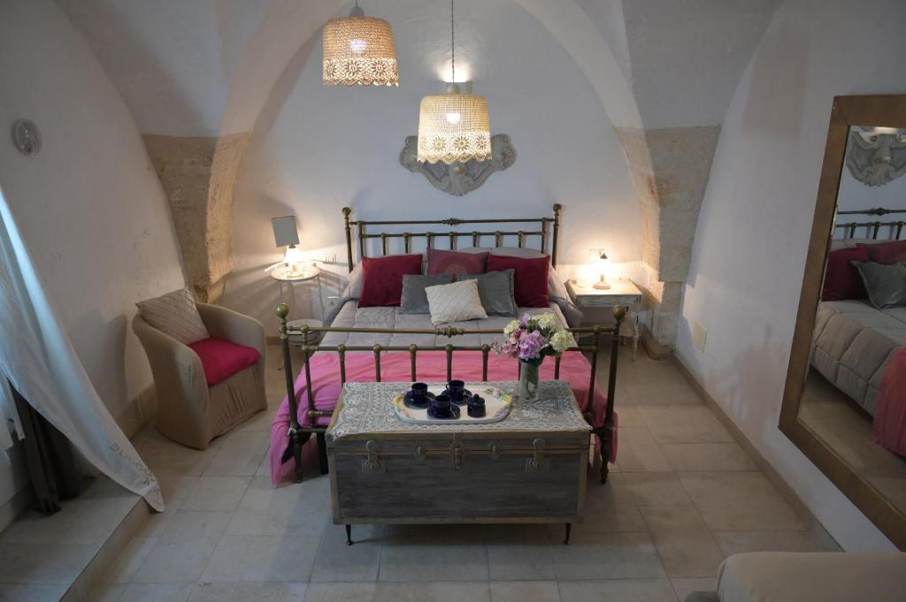 Postel nebo postele na pokoji v ubytování Masseria Verbena Agriturismo