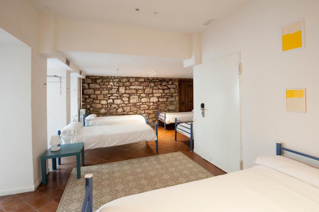 Postel nebo postele na pokoji v ubytování A Room In The City Hostel