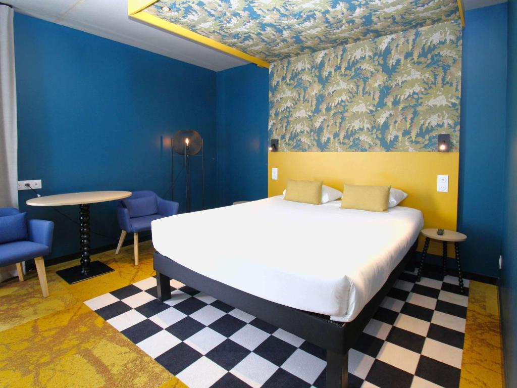 Postel nebo postele na pokoji v ubytování ibis Styles Dijon Sud Domaine De Beauregard 21600 Longvic