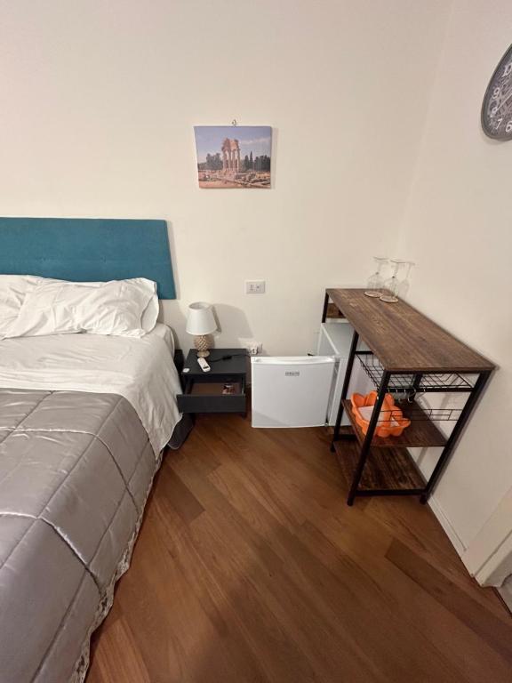 Postel nebo postele na pokoji v ubytování Atenea centro