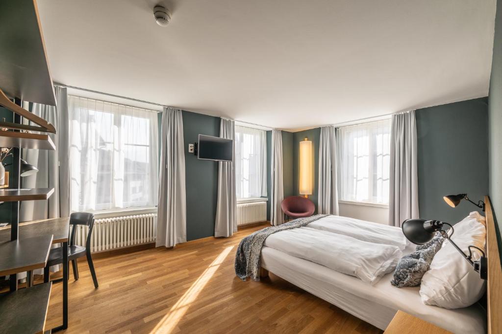 Postel nebo postele na pokoji v ubytování Hotel Jakob