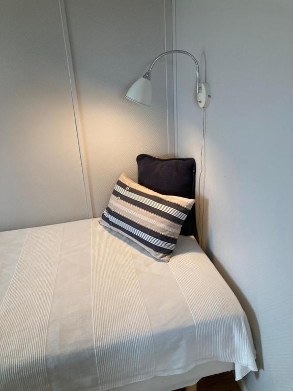Postel nebo postele na pokoji v ubytování Slimmingegården 1019