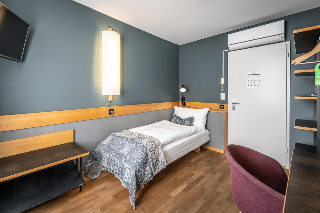 Postel nebo postele na pokoji v ubytování Hotel Jakob