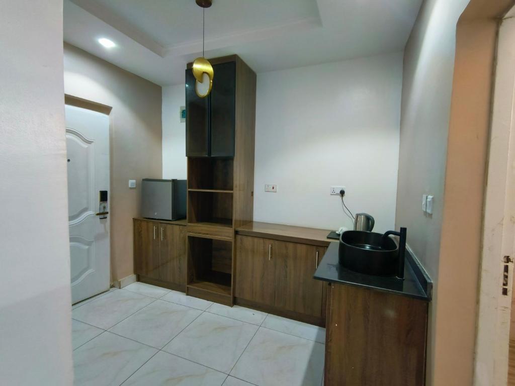 Eldhús eða eldhúskrókur á S A Luxury Apartments