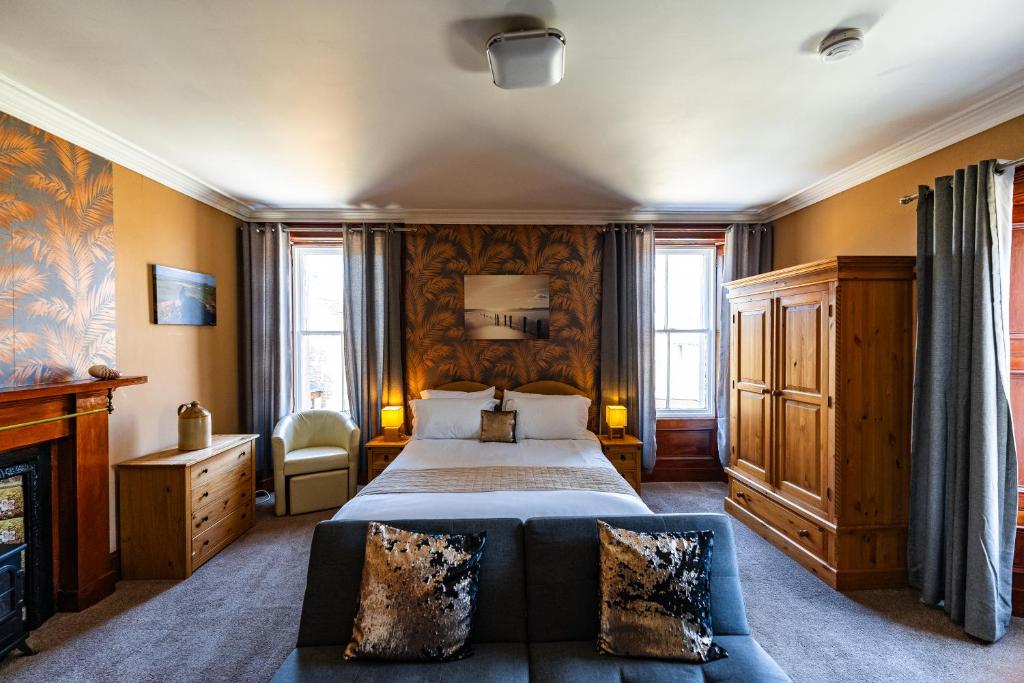 Ένα ή περισσότερα κρεβάτια σε δωμάτιο στο Thorshaven Apartment, Orkney