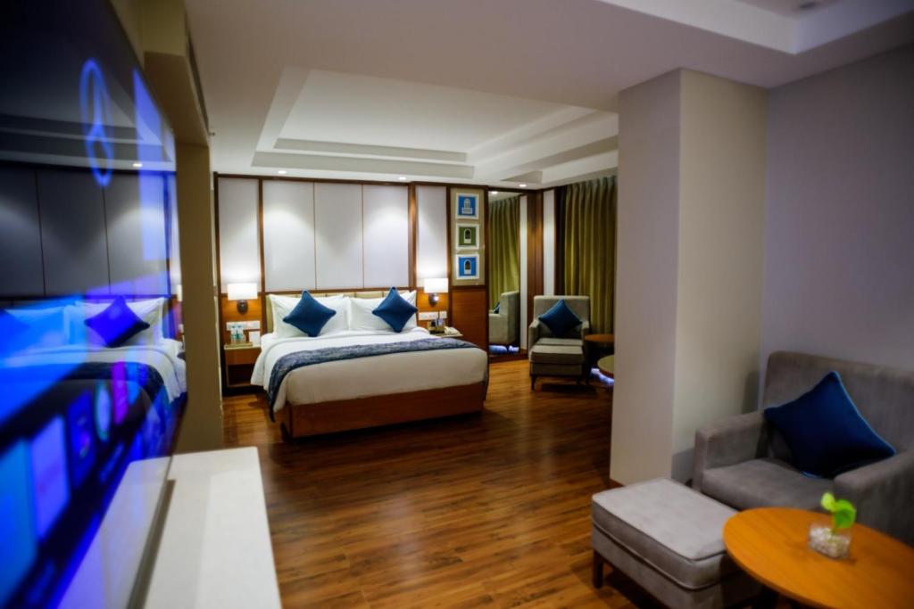 Postel nebo postele na pokoji v ubytování Fortune Select Candolim, Goa - Member ITC Hotels' Group
