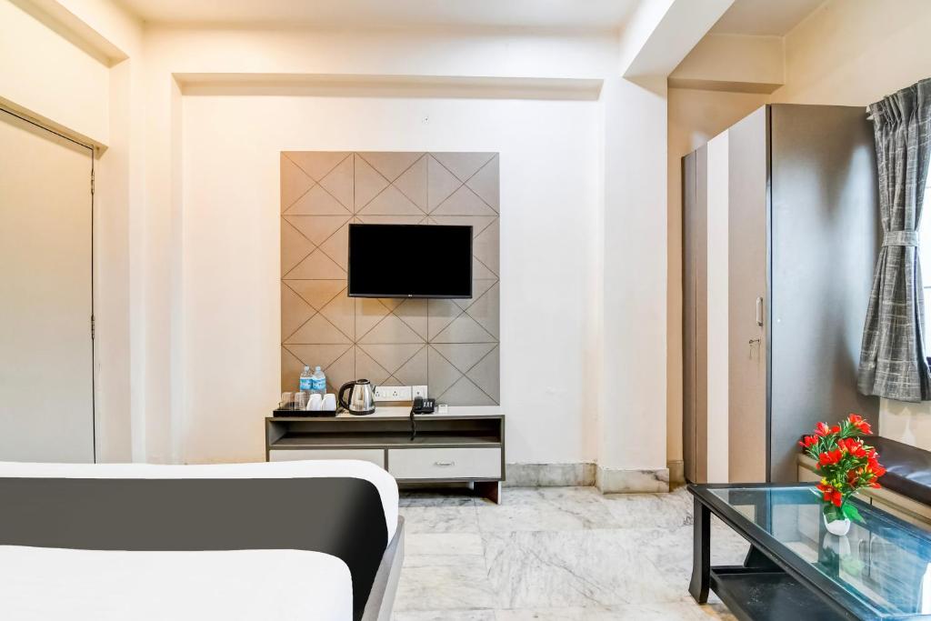 TV a/nebo společenská místnost v ubytování Hotel O Tagore Park