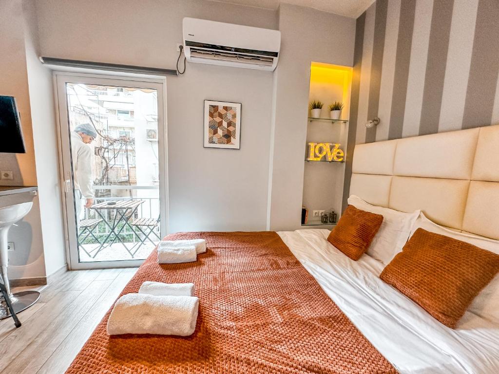 Posteľ alebo postele v izbe v ubytovaní Walk to Markets from a Cozy Studio by Cielo Homes