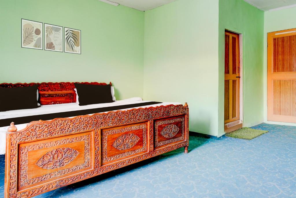 Postel nebo postele na pokoji v ubytování Collection O Rajbagh