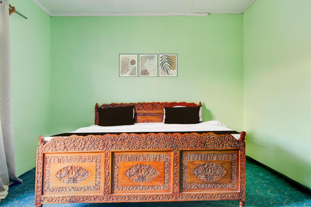Postel nebo postele na pokoji v ubytování Collection O Rajbagh