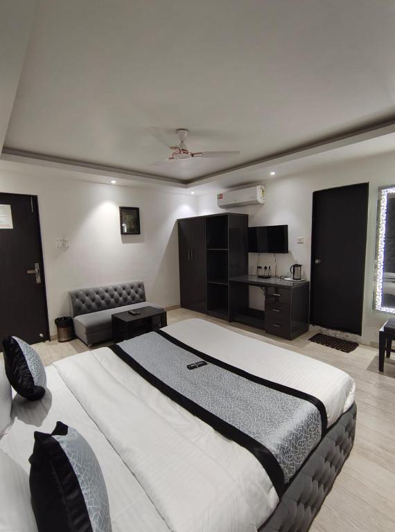 Postel nebo postele na pokoji v ubytování Hotel VENUE INN