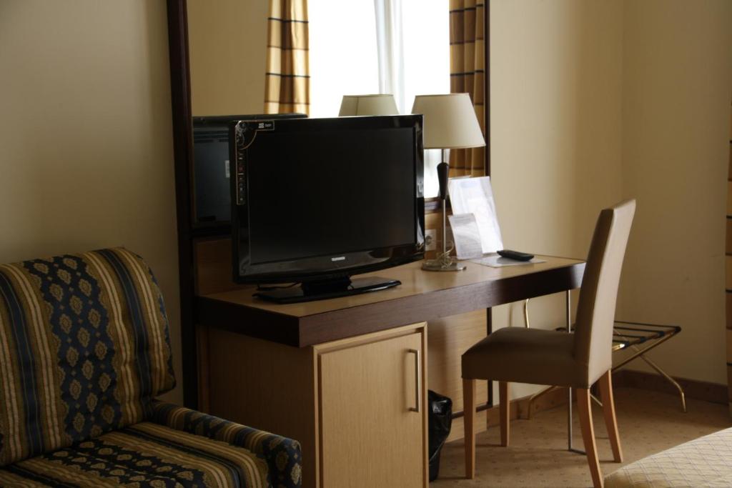 TV a/nebo společenská místnost v ubytování Inn Hotel