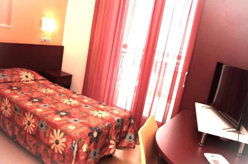 Postel nebo postele na pokoji v ubytování Meublé Nautic Rooms b&b