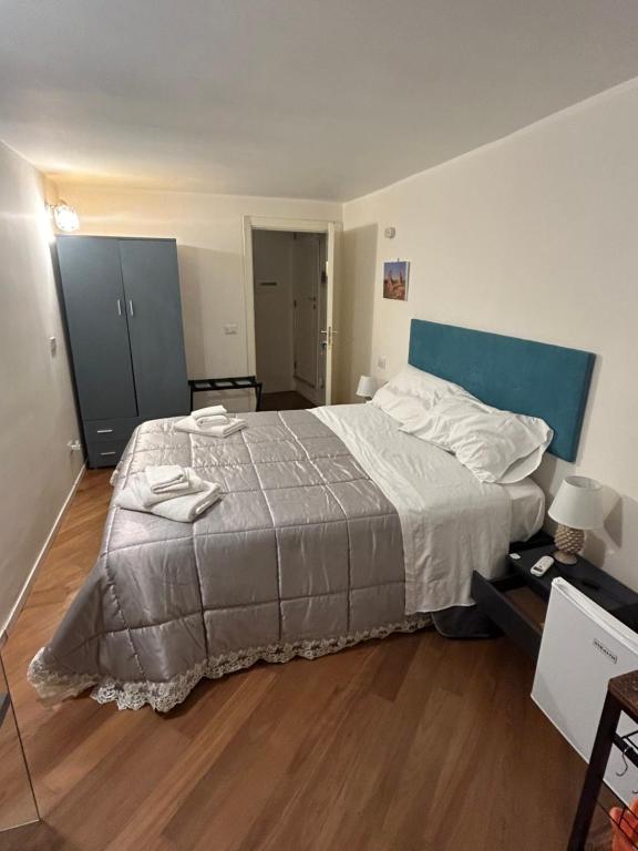 Postel nebo postele na pokoji v ubytování Atenea centro