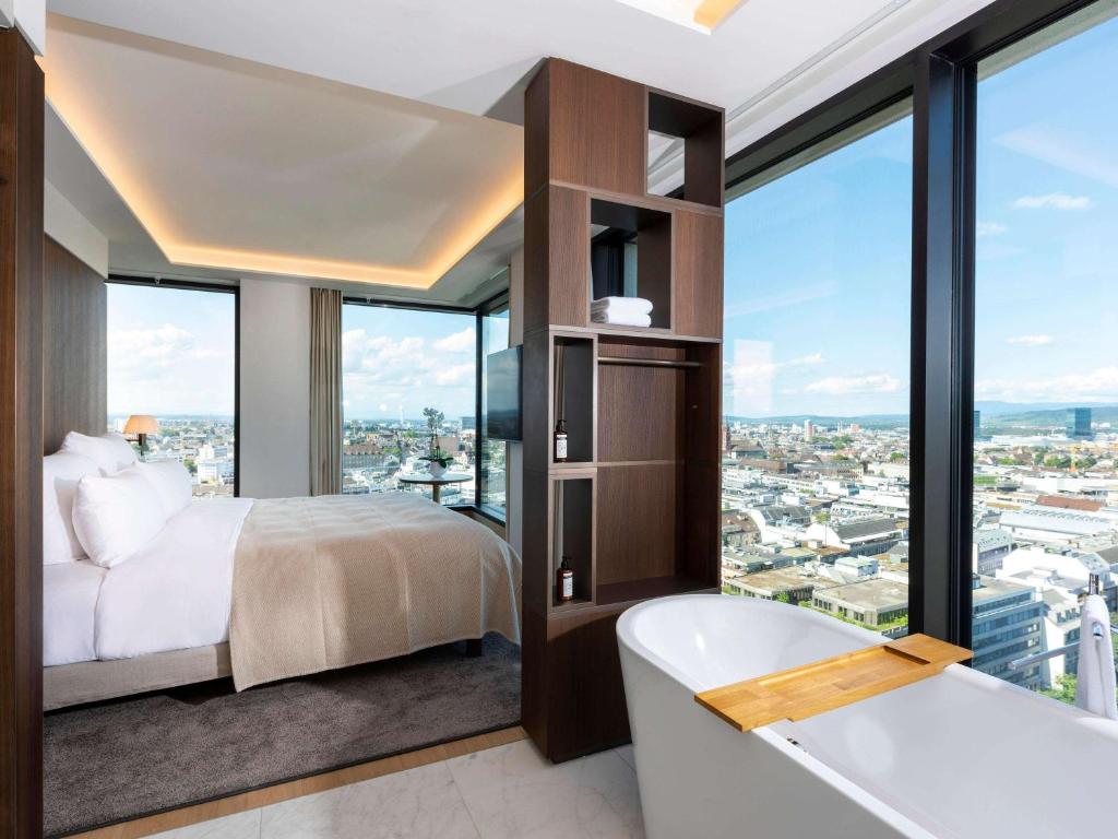 Voodi või voodid majutusasutuse Mövenpick Hotel Basel toas