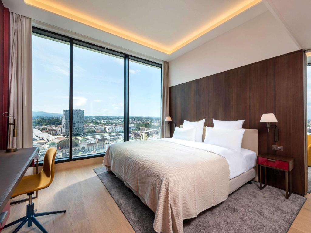Voodi või voodid majutusasutuse Mövenpick Hotel Basel toas