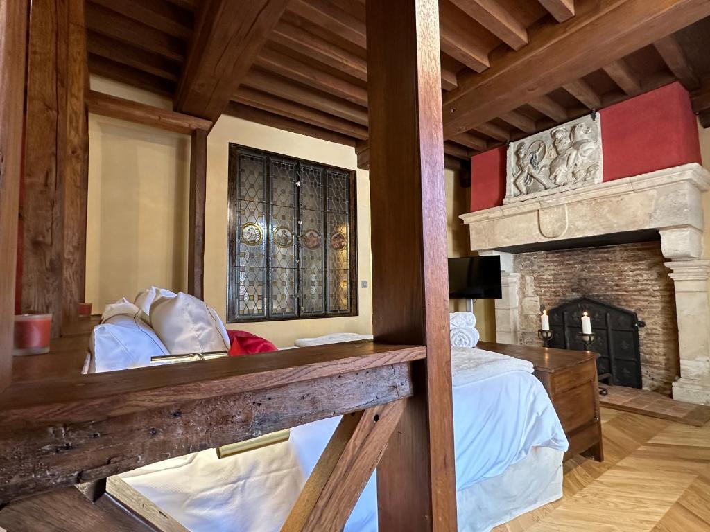Postel nebo postele na pokoji v ubytování Gite, chambre d hôte L échoppe est belle