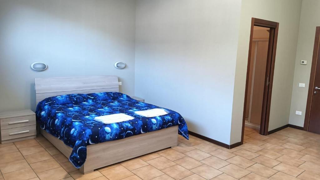 Postel nebo postele na pokoji v ubytování Casthello Ostello di Vallecamonica